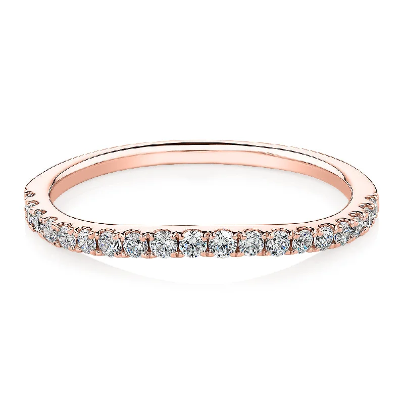 Luxury Gold Wedding Bands-Curved wedding or eternity band with 0.25 carats* of diamond simulants in 10 carat rose gold