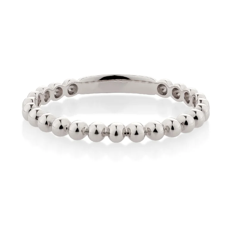 Oval Diamond Rings-Wedding or eternity band in 10 carat white gold