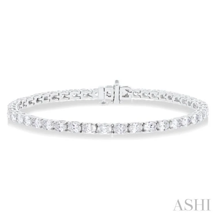 Handmade Beaded Bracelets-5 1/2 ctw East West Oval Cut Diamond Fashion Tennis bracelet in 14K White Gold