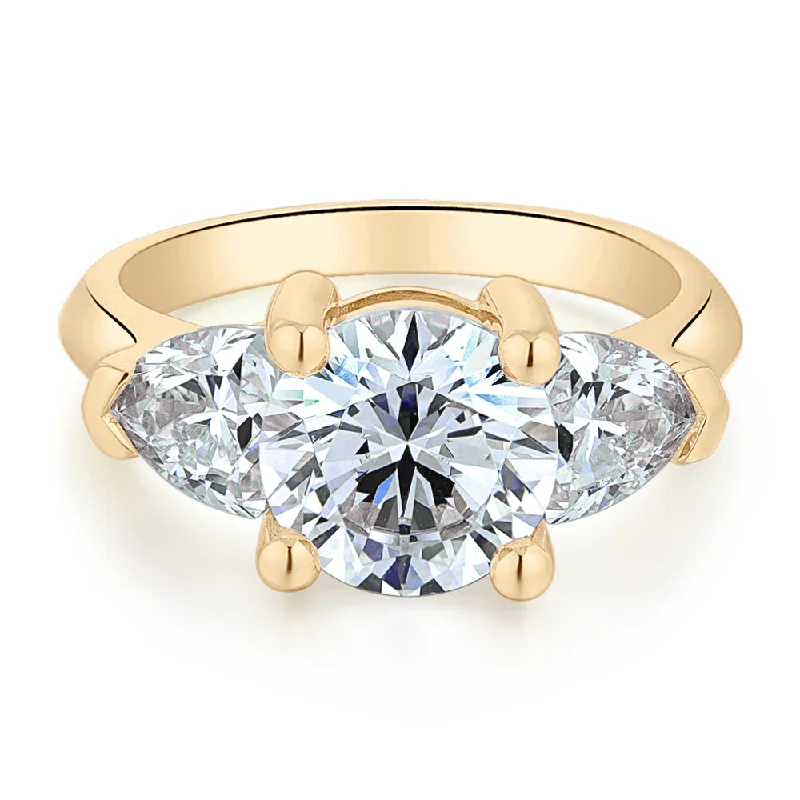 Handmade Engagement Rings-Three stone ring with 4.15 carats* of diamond simulants in 10 carat yellow gold