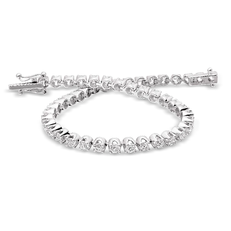 Simple Personalized Bracelets-Elara 18ct White Gold Crown Set Diamond Bracelet