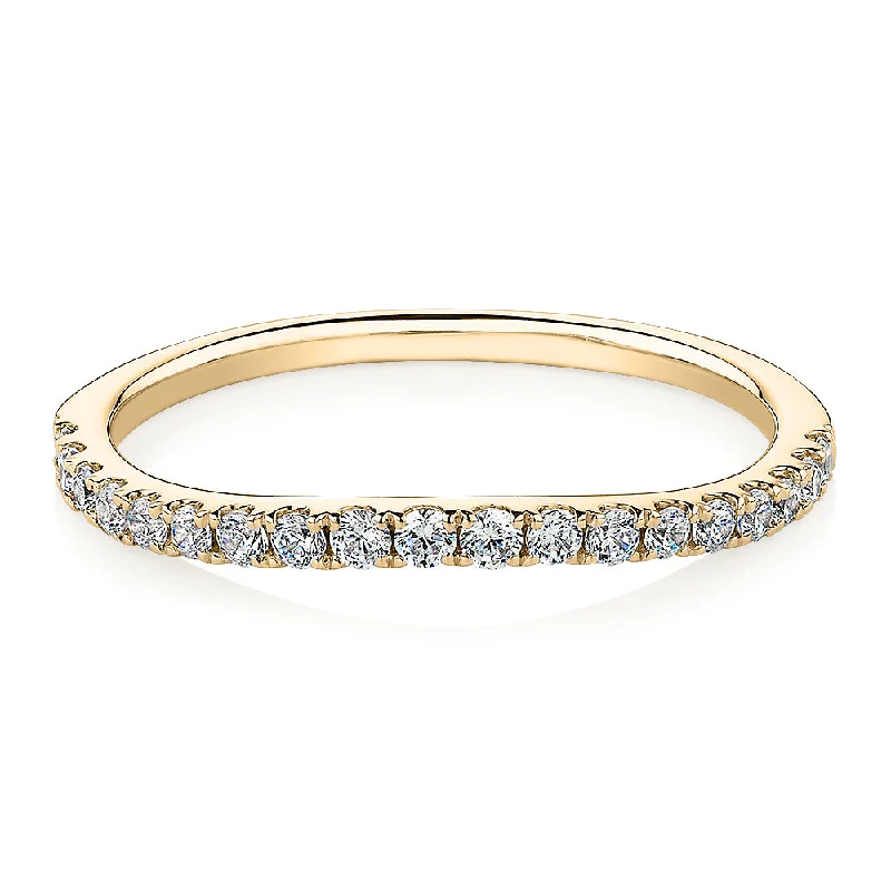 Birthstone Diamond Rings-Curved wedding or eternity band with 0.25 carats* of diamond simulants in 10 carat yellow gold