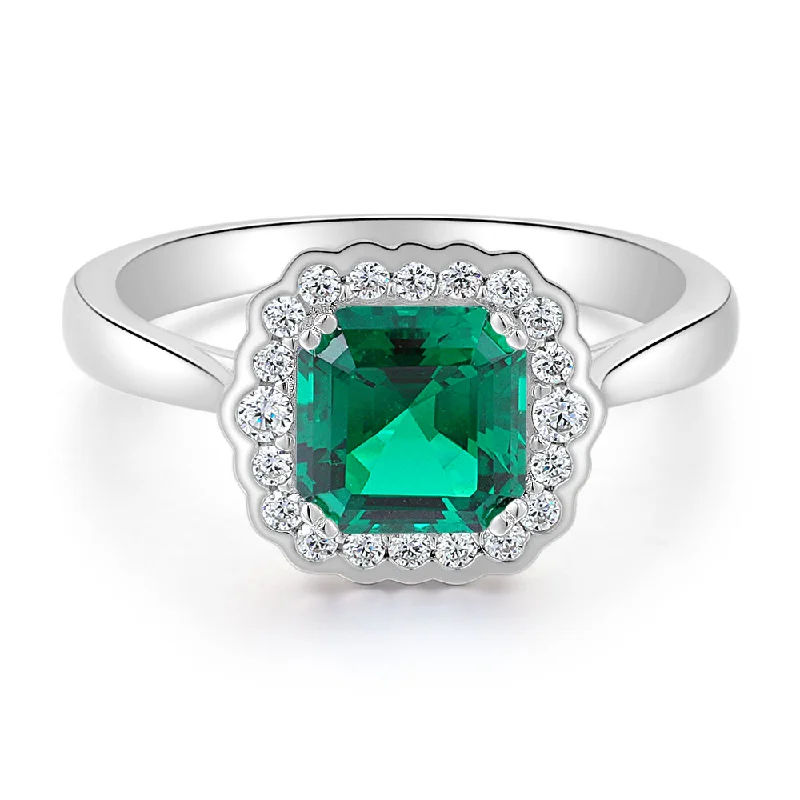 Gemstone Solitaire Rings-Dress ring with emerald simulant in sterling silver