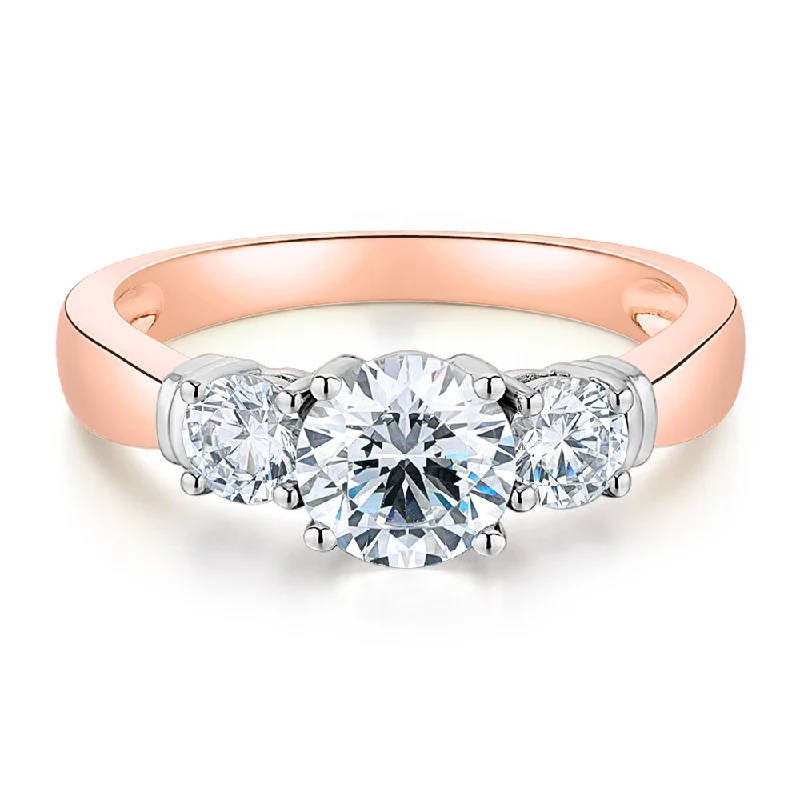 Dainty Engagement Rings-Three stone ring with 1.53 carats* of diamond simulants in 14 carat rose and white gold