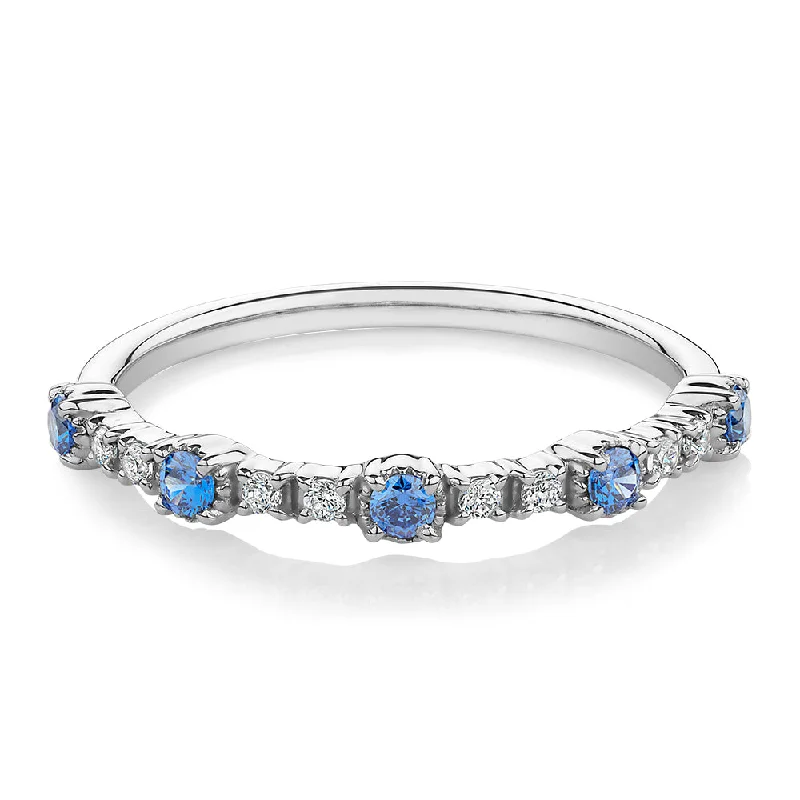 Black Gold Engagement Rings-Wedding or eternity band with blue topaz and diamond simulants in 10 carat white gold